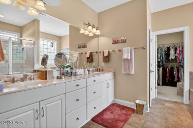This custom-built brick home offers 2,970 sq.ft. of living space on Magnolia Greens Golf Plantation in North Carolina - for sale on GolfHomes.com, golf home, golf lot