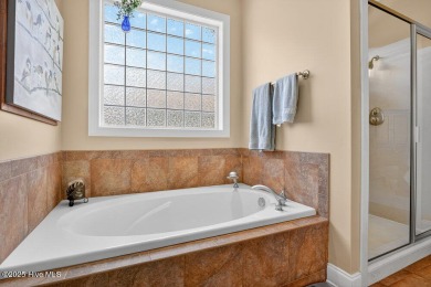 This custom-built brick home offers 2,970 sq.ft. of living space on Magnolia Greens Golf Plantation in North Carolina - for sale on GolfHomes.com, golf home, golf lot