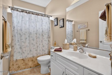 This custom-built brick home offers 2,970 sq.ft. of living space on Magnolia Greens Golf Plantation in North Carolina - for sale on GolfHomes.com, golf home, golf lot