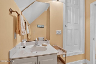 This custom-built brick home offers 2,970 sq.ft. of living space on Magnolia Greens Golf Plantation in North Carolina - for sale on GolfHomes.com, golf home, golf lot