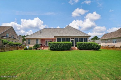 This custom-built brick home offers 2,970 sq.ft. of living space on Magnolia Greens Golf Plantation in North Carolina - for sale on GolfHomes.com, golf home, golf lot