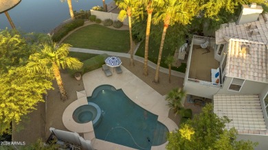 Experience serene living on this exceptional waterfront lot on The Legend at Arrowhead in Arizona - for sale on GolfHomes.com, golf home, golf lot