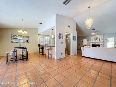 A brand new roof will top this terrific home before closing! on Oak Hills Country Club in Florida - for sale on GolfHomes.com, golf home, golf lot