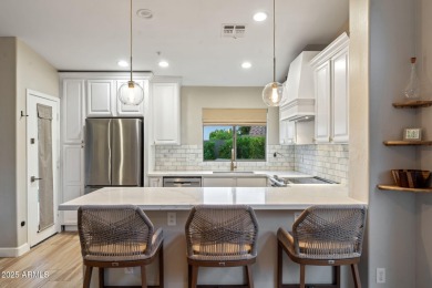 Updated and beautifully maintained, this popular split on Sanctuary Golf Course At WestWorld in Arizona - for sale on GolfHomes.com, golf home, golf lot