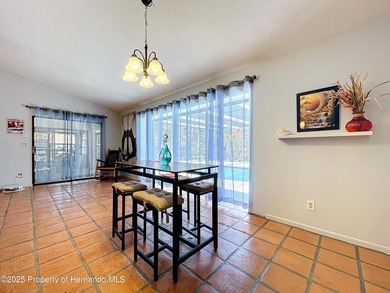 A brand new roof will top this terrific home before closing! on Oak Hills Country Club in Florida - for sale on GolfHomes.com, golf home, golf lot