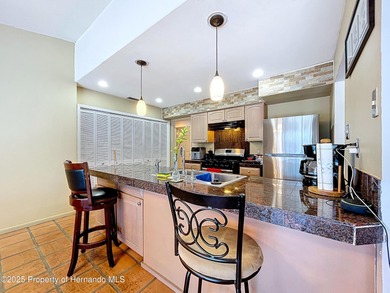 A brand new roof will top this terrific home before closing! on Oak Hills Country Club in Florida - for sale on GolfHomes.com, golf home, golf lot