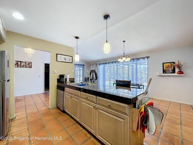 A brand new roof will top this terrific home before closing! on Oak Hills Country Club in Florida - for sale on GolfHomes.com, golf home, golf lot