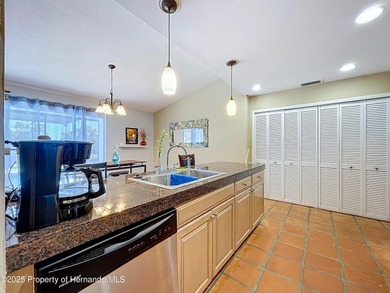 A brand new roof will top this terrific home before closing! on Oak Hills Country Club in Florida - for sale on GolfHomes.com, golf home, golf lot