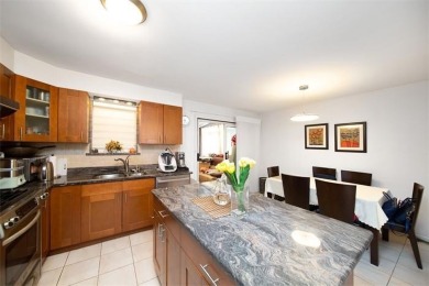 Welcome to this charming all-brick single-family home, perfectly on Douglaston Park Golf Course in New York - for sale on GolfHomes.com, golf home, golf lot
