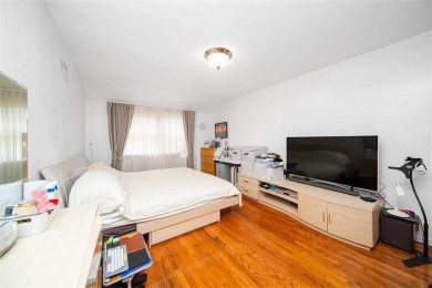 Welcome to this charming all-brick single-family home, perfectly on Douglaston Park Golf Course in New York - for sale on GolfHomes.com, golf home, golf lot