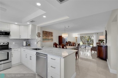 THIS BEAUTIFULLY REDESIGNED AND CRAFTED CONDO for your most on Wynmoor Golf Course in Florida - for sale on GolfHomes.com, golf home, golf lot