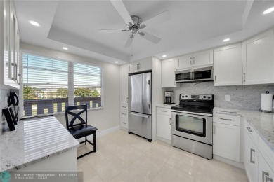 THIS BEAUTIFULLY REDESIGNED AND CRAFTED CONDO for your most on Wynmoor Golf Course in Florida - for sale on GolfHomes.com, golf home, golf lot