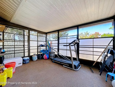 A brand new roof will top this terrific home before closing! on Oak Hills Country Club in Florida - for sale on GolfHomes.com, golf home, golf lot