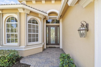 BEAUTIFULLY UPDATED POOL & SPA HOME IN PGA VILLAGE WITH LAKE on PGA Golf Club in PGA Village in Florida - for sale on GolfHomes.com, golf home, golf lot