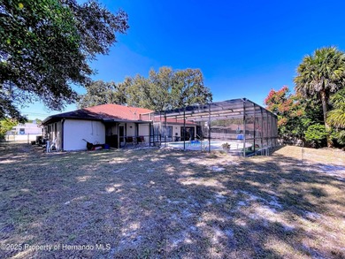 A brand new roof will top this terrific home before closing! on Oak Hills Country Club in Florida - for sale on GolfHomes.com, golf home, golf lot