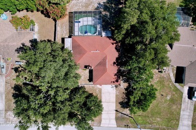 A brand new roof will top this terrific home before closing! on Oak Hills Country Club in Florida - for sale on GolfHomes.com, golf home, golf lot