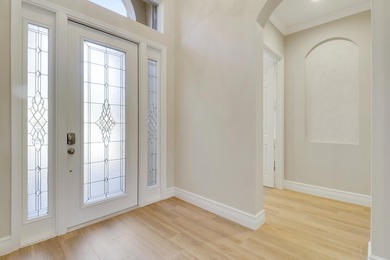 BEAUTIFULLY UPDATED POOL & SPA HOME IN PGA VILLAGE WITH LAKE on PGA Golf Club in PGA Village in Florida - for sale on GolfHomes.com, golf home, golf lot