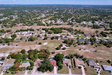 A brand new roof will top this terrific home before closing! on Oak Hills Country Club in Florida - for sale on GolfHomes.com, golf home, golf lot