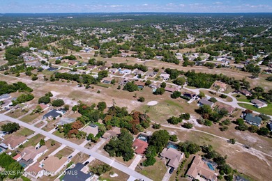 A brand new roof will top this terrific home before closing! on Oak Hills Country Club in Florida - for sale on GolfHomes.com, golf home, golf lot