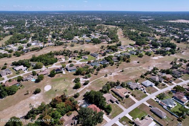 A brand new roof will top this terrific home before closing! on Oak Hills Country Club in Florida - for sale on GolfHomes.com, golf home, golf lot