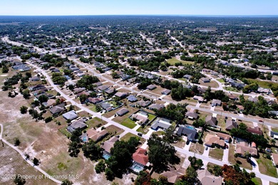 A brand new roof will top this terrific home before closing! on Oak Hills Country Club in Florida - for sale on GolfHomes.com, golf home, golf lot
