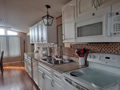 This Home Has New Laminate Flooring Throughout.  New on Riverwood Golf Club in Florida - for sale on GolfHomes.com, golf home, golf lot