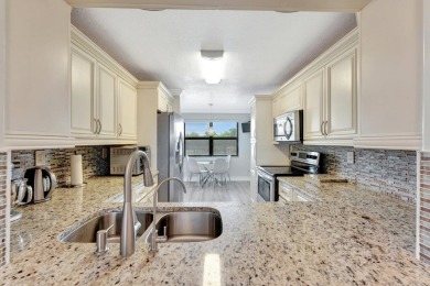 For Sale: Stunning 2-Bedroom Condo in Sunrise Lakes Condominiums on Sunrise Lakes Phase IV Golf Course in Florida - for sale on GolfHomes.com, golf home, golf lot