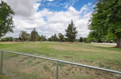 Live on the green and experience the charm of this well-loved on Sundale Country Club in California - for sale on GolfHomes.com, golf home, golf lot