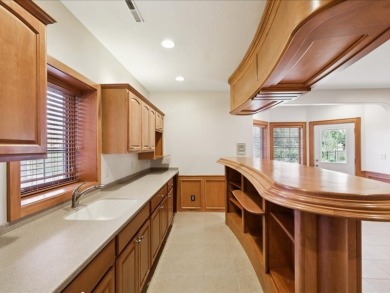 This spacious 4 bed, 4 bath home featuring over 4,000 sq ft is a on Otter Creek Golf Course in Iowa - for sale on GolfHomes.com, golf home, golf lot