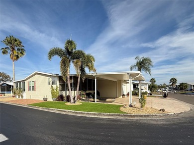 Wake up each day to warm breezes, glowing sunsets, and the easy on Apollo Beach Golf and Sea Club in Florida - for sale on GolfHomes.com, golf home, golf lot