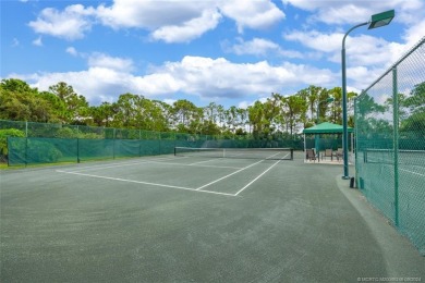 Discover Your Dream Home in Jensen Beach Country Club.  This on Eagle Marsh Golf Club in Florida - for sale on GolfHomes.com, golf home, golf lot