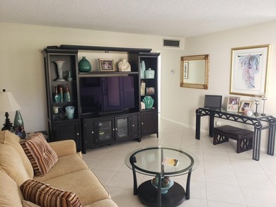 Impeccably maintained 1st floor True End Unit 2 Bedroom Condo in on Kings Point Golf -Flanders Way in Florida - for sale on GolfHomes.com, golf home, golf lot