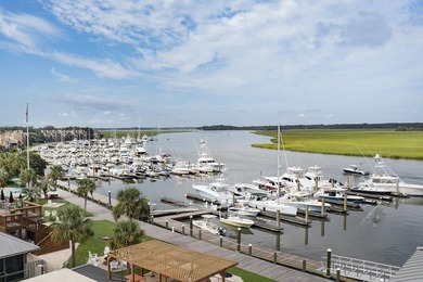 Elevator- Community Pool- Screen Porch-Stunning Marsh on The Seabrook Island Club in South Carolina - for sale on GolfHomes.com, golf home, golf lot