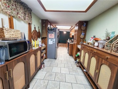 Charming 2-bed, 2-bath home in a quiet Bella Vista neighborhood on Bella Vista Country Club - Scottsdale in Arkansas - for sale on GolfHomes.com, golf home, golf lot