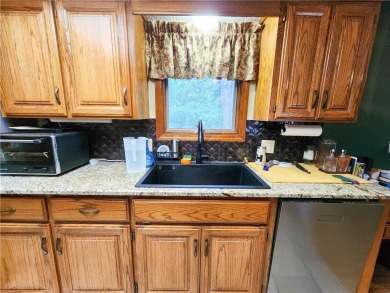 Charming 2-bed, 2-bath home in a quiet Bella Vista neighborhood on Bella Vista Country Club - Scottsdale in Arkansas - for sale on GolfHomes.com, golf home, golf lot