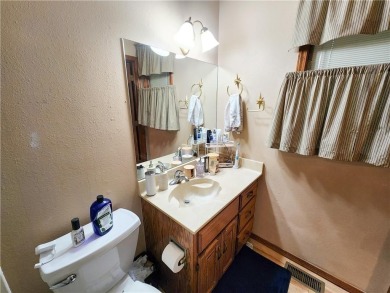 Charming 2-bed, 2-bath home in a quiet Bella Vista neighborhood on Bella Vista Country Club - Scottsdale in Arkansas - for sale on GolfHomes.com, golf home, golf lot