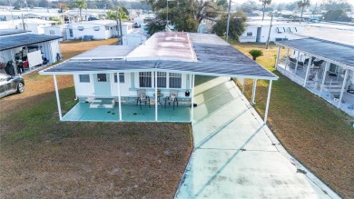 Step into this delightful 2-bedroom, 2-bath home in Betmar Acres on Betmar Acres Golf Club in Florida - for sale on GolfHomes.com, golf home, golf lot