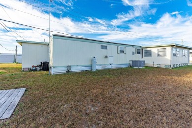 Step into this delightful 2-bedroom, 2-bath home in Betmar Acres on Betmar Acres Golf Club in Florida - for sale on GolfHomes.com, golf home, golf lot