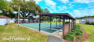 55+/1989/2 BD/2 BA/800 SQ FT/NEW FLOORING/LARGE SCREENED LANAI on Zephyrhills Municipal Golf Course in Florida - for sale on GolfHomes.com, golf home, golf lot