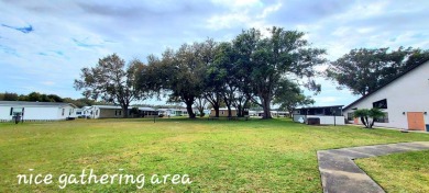 55+/1989/2 BD/2 BA/800 SQ FT/NEW FLOORING/LARGE SCREENED LANAI on Zephyrhills Municipal Golf Course in Florida - for sale on GolfHomes.com, golf home, golf lot