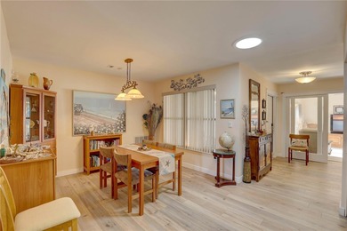 Welcome to elevated Florida living at its finest in this on Highland Lakes Executive Golf Course in Florida - for sale on GolfHomes.com, golf home, golf lot