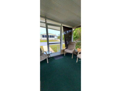 55+/1989/2 BD/2 BA/800 SQ FT/NEW FLOORING/LARGE SCREENED LANAI on Zephyrhills Municipal Golf Course in Florida - for sale on GolfHomes.com, golf home, golf lot