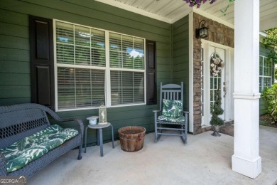 Nestled in highly sought-after Curtis Farm, this beautiful on Woodmont Golf and Country Club in Georgia - for sale on GolfHomes.com, golf home, golf lot