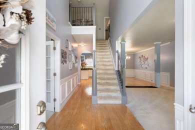 Nestled in highly sought-after Curtis Farm, this beautiful on Woodmont Golf and Country Club in Georgia - for sale on GolfHomes.com, golf home, golf lot