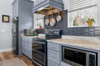 Stunning contemporary home on golf course with panoramic views on The Trail At Chickasaw Pointe in South Carolina - for sale on GolfHomes.com, golf home, golf lot