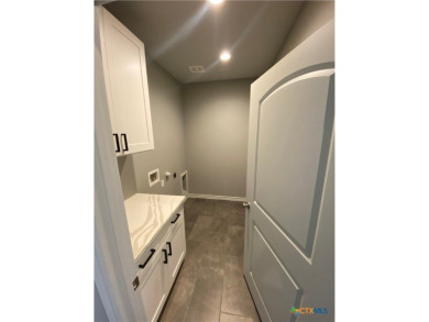 Beautiful NEW home in the desired golf course community of on Vaaler Creek Golf Club in Texas - for sale on GolfHomes.com, golf home, golf lot