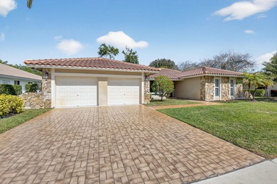 HOUSE IS PRICED TO SELL.  Fabulous 1-story pool home with 2-car on Boca Greens Country Club in Florida - for sale on GolfHomes.com, golf home, golf lot
