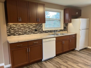 Don't miss this completely remodeled, move-in ready gem! This on Ridgeview Golf Course in Michigan - for sale on GolfHomes.com, golf home, golf lot