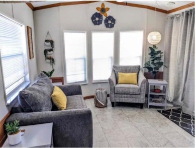 Immaculate newly updated Champion park model is ready for next on Clerbrook Resort, Inc. in Florida - for sale on GolfHomes.com, golf home, golf lot
