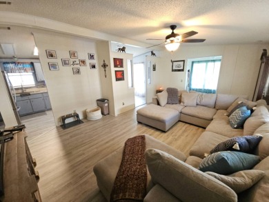 Discover Florida Living in this 1989, 2-bed/2-bath home located on The Club At Pointe West in Florida - for sale on GolfHomes.com, golf home, golf lot